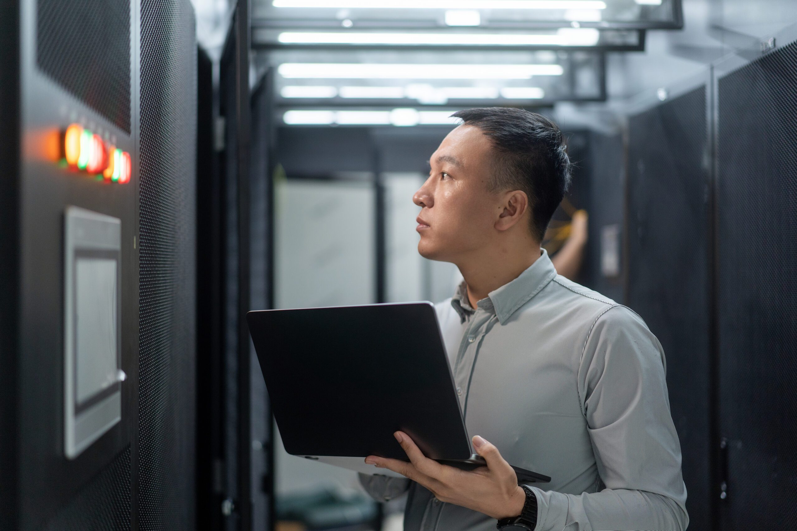 asian engineer working in database