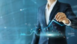 Businessman draw growth graph and progress of business and analy