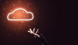 Digital cloud icon as symbol of wireless connection on dark back