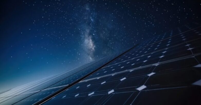 Long-exposure night shot of solar panels under a starry sky with faint moonlight glinting off glass Long-exposure night shot of solar panels under a starry sky with faint moonlight glinting off glass