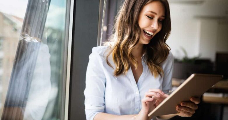 Successful business woman looking confident and smiling