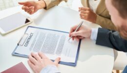 Unrecognizable Businessman Signing Contract Top View