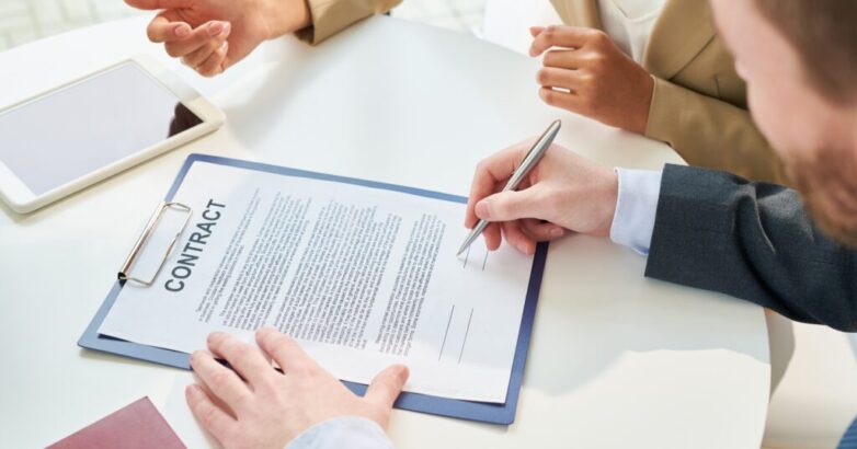 Unrecognizable Businessman Signing Contract Top View Unrecognizable Businessman Signing Contract Top View