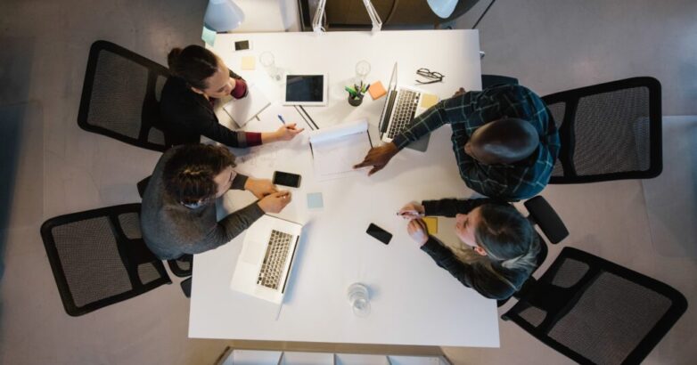 Diverse team analyzing data Diverse team analyzing data