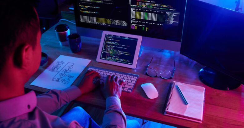 Hard-Working Programmer Writing Code