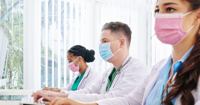 Doctors entering patients data Doctors entering patients data