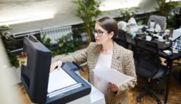 Businesswoman Scanning Documents