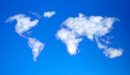 Sky with clouds in shape of world map.