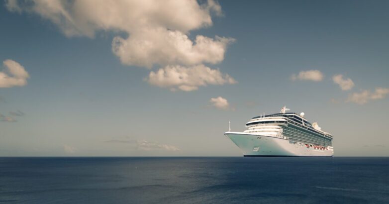 Cruise liner on blue ocean.