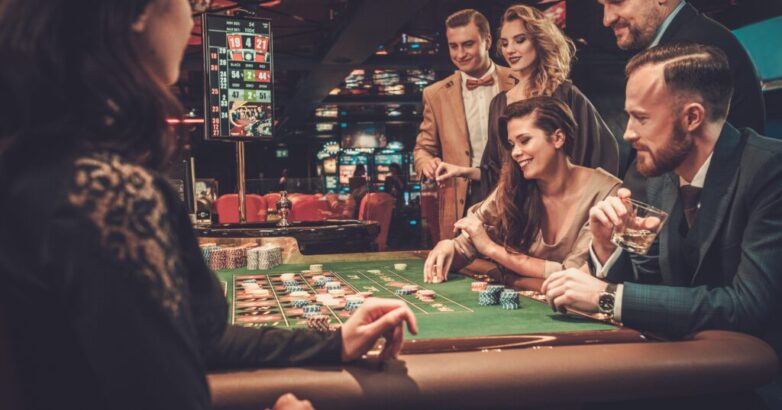 Upper class friends gambling in a casino
