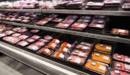 Shelves with fresh meat in supermarket