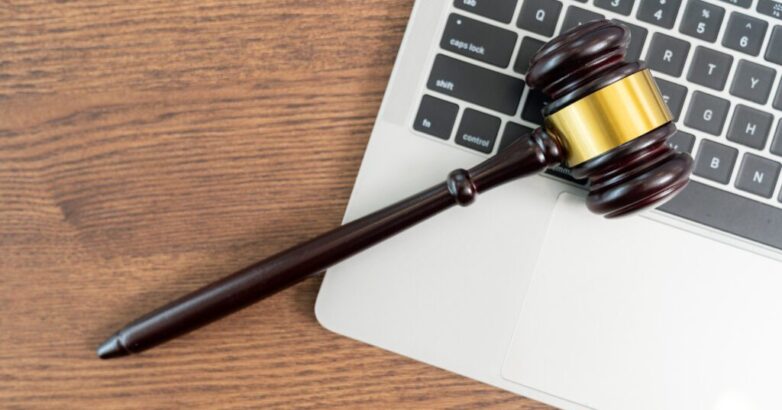 Laptop computer and judge's gavel