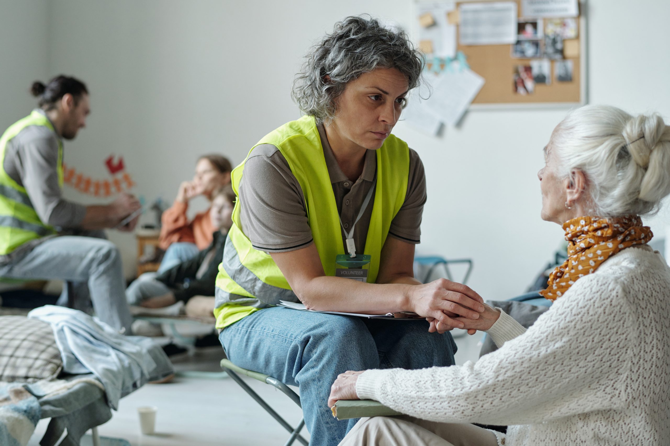 Listening to refugee story in camp