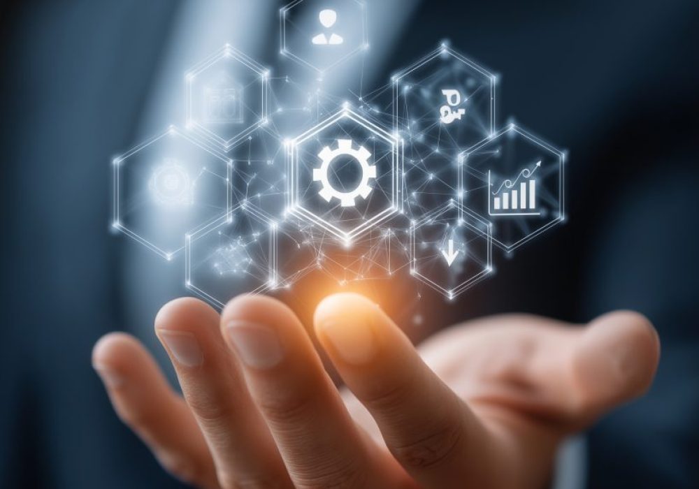 Innovation at Your Fingertips: A professional's hand cradles a futuristic digital interface, symbolizing technology, innovation, and digital transformation in the modern age.