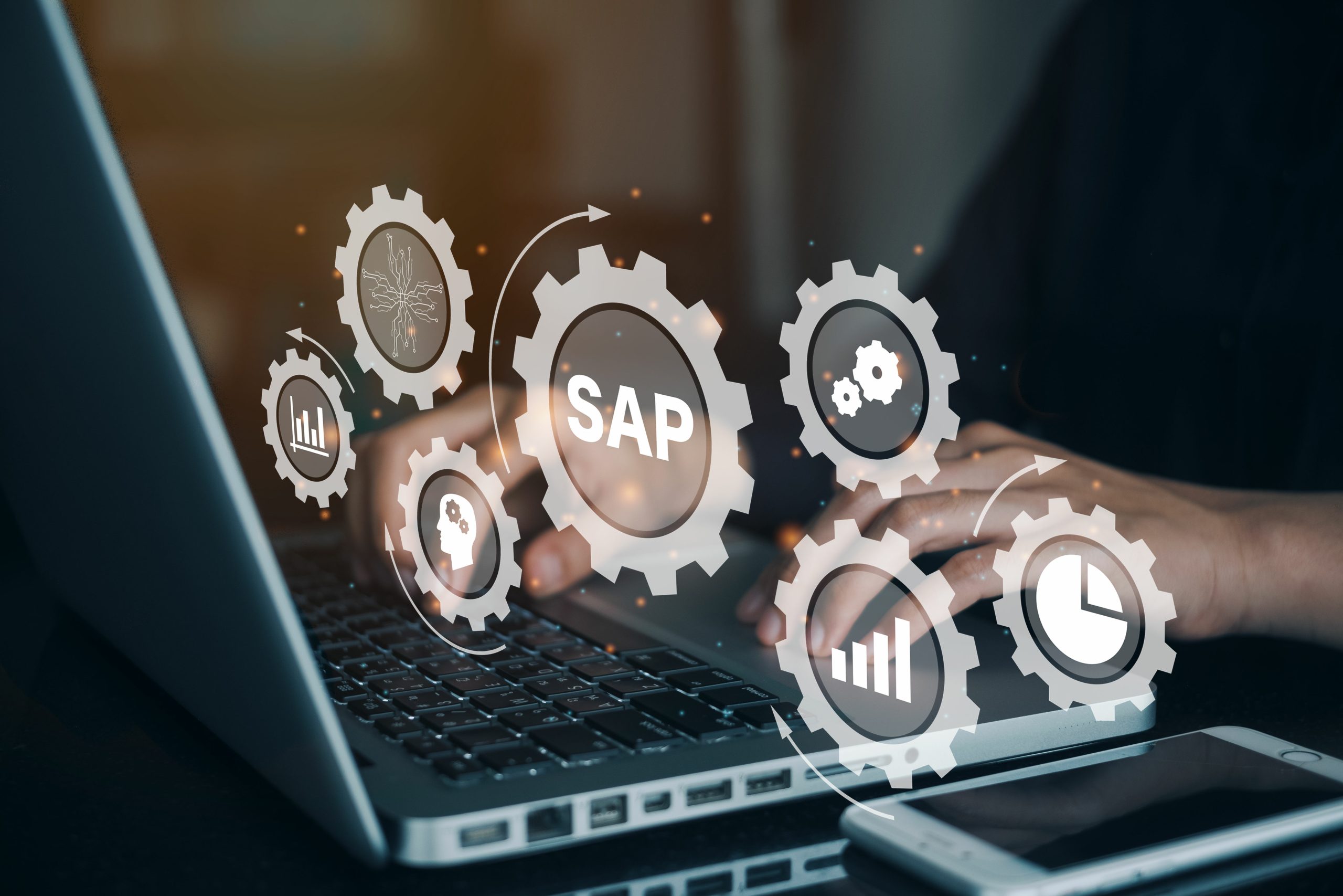 Person working on computer with icons of SAP - Business process automation software. ERP enterprise resources planning system concept on virtual screen..